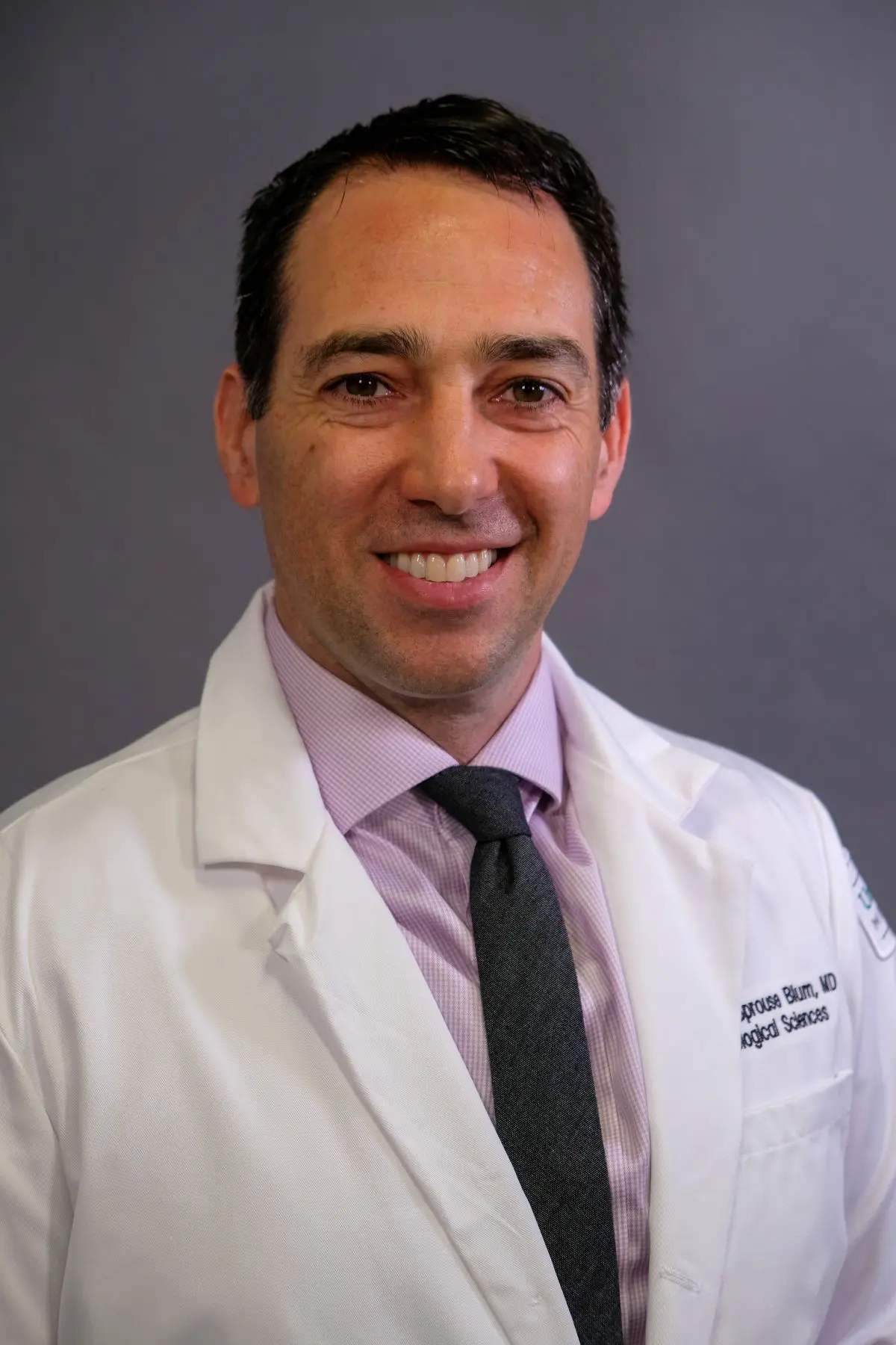 Dr. Adam Sprouse-Blum